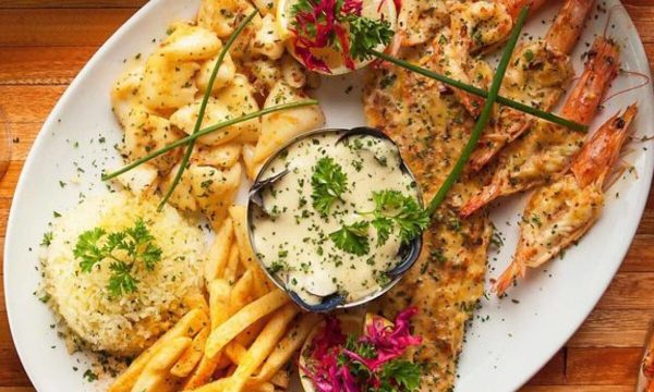 A prawn dish paired with french fries and rice - Rosebank restaurants 