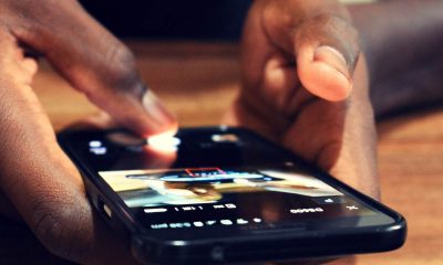Someone using mobile phone - South Africans are the biggest internet addicts in the world