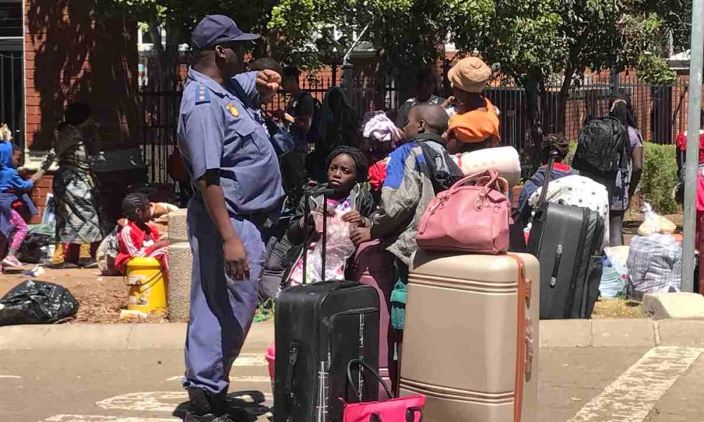 law enforcement officials is preparing to evict a group of refugees camping at the United Nations High Commission for Refugees