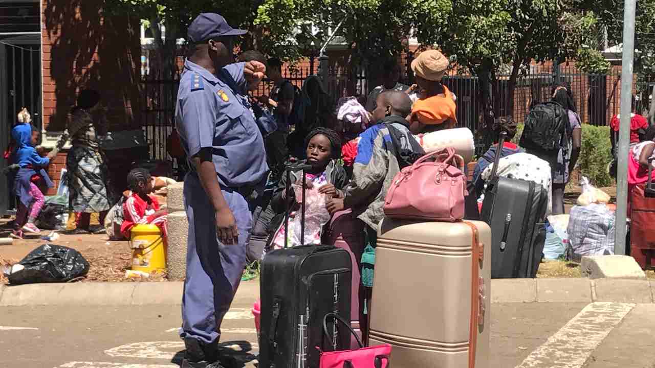 law enforcement officials is preparing to evict a group of refugees camping at the United Nations High Commission for Refugees