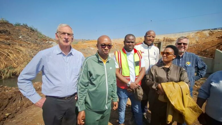 Dr Gerhard Koornhof and Park Tau with a party conducting an oversight visit on August 21