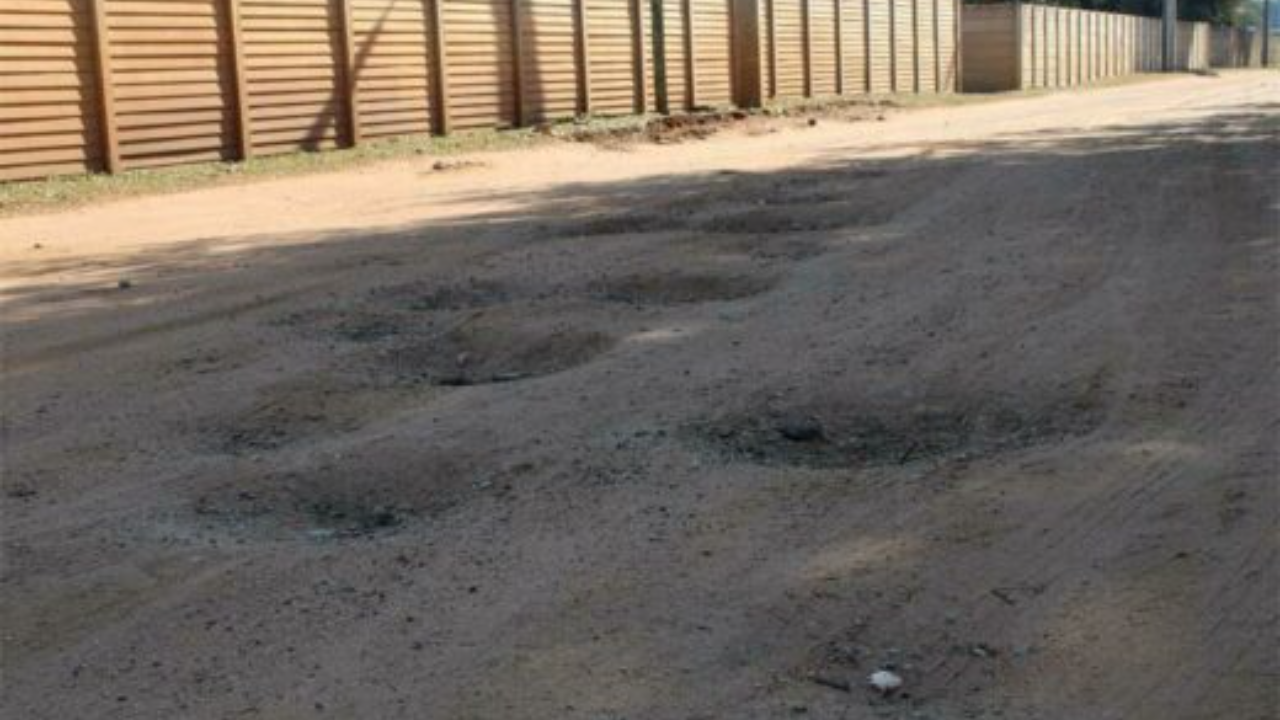 Residents in Larch Road, Petit are demanding that the City of Ekurhuleni takes action and formalise the road, littered with countless potholes.