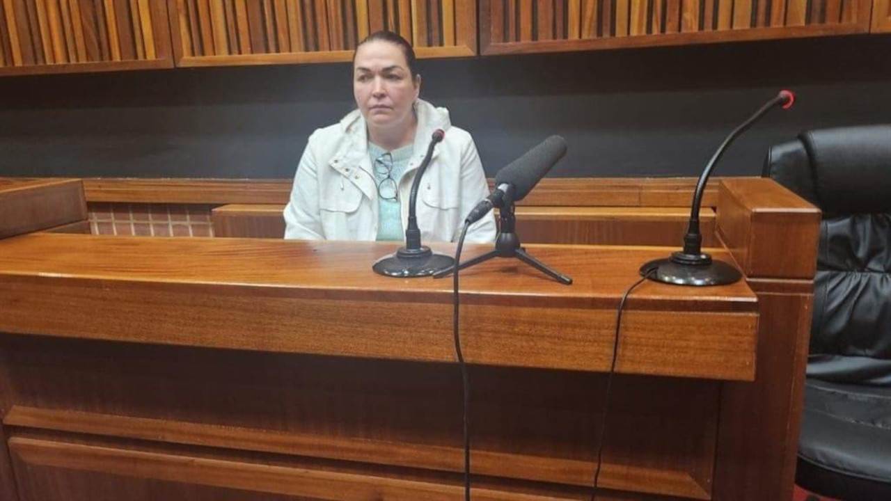 Steenkamp claims her husband forced her to commit fraud