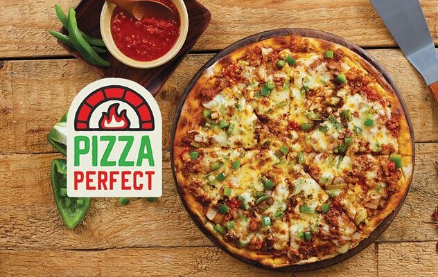 A delicious wood-fired pizza from Pizza Perfect Johannesburg, fresh ingredients, handcrafted crust, spicy peri-peri chicken pizza, vegan pizza option, cozy local pizza restaurant, vibrant dining atmosphere, fast pizza delivery Johannesburg, best pizza Joburg, authentic flavors, family-friendly eatery, tasty margherita pizza, Joburg ETC