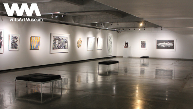 Exterior view, Wits Art Museum, Braamfontein, Johannesburg, modern architecture. Gallery interior, Wits Art Museum Johannesburg, traditional African artworks, sculptures. Visitors, African art exhibition, Wits Art Museum, Johannesburg. Jack Ginsberg Centre, artist’s books, Wits Art Museum, Johannesburg, rare collection. African artifacts, Standard Bank Collection, Wits Art Museum, Johannesburg. Art education workshop, Wits Art Museum, Johannesburg, community program. Museum architecture, interior detail, Wits Art Museum, Johannesburg, natural lighting. Wits University students, art engagement, Wits Art Museum, Johannesburg, Joburg ETC