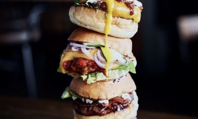 Hudsons Burger Joint Parkhurst exterior, casual dining restaurant Johannesburg, juicy beef burger with fresh toppings, crispy golden fries, milkshake and craft soda drinks, cozy local hangout spot, vibrant Parkhurst neighbourhood, popular burger joint South Africa, relaxed atmosphere, friendly staff, casual meal in Jozi, vegetarian burger option, comfort food South Africa, trendy foodie destination, inviting burger restaurant, Joburg ETC