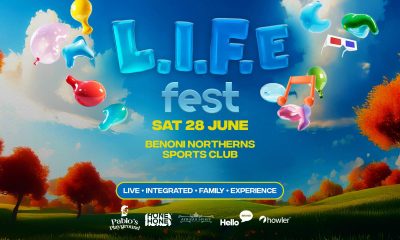 Families enjoying live music at LIFE Fest Benoni, vibrant food stalls serving Thai street food, shawarmas and boerie rolls, children playing on inflatable rides and obstacle courses, Springboks vs Barbarians rugby screening on a big outdoor screen, artists like Matthew Mole and Majozi performing on stage, community atmosphere near Johannesburg, family-friendly festival in Gauteng, kids under 12 free entry, local music and culture celebration, Benoni events 2025, proudly South African day out, Joburg ETC