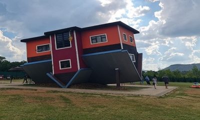 The Upside Down House in Hartbeespoort, unique attraction, upside down building, quirky architecture, interactive experience, family-friendly outing, photo opportunities, fun day trip from Johannesburg, kids’ play area, jumping castles, kiddies rides, takeaway food, burgers and hot dogs, unusual tourist spot, angled house design, creative photos, Hartbeespoort travel, South Africa attractions, outdoor adventure, local getaway near Joburg, Joburg ETC
