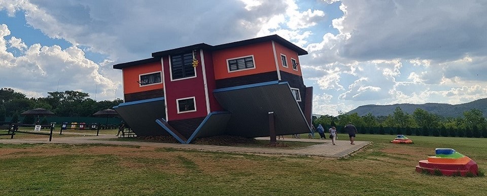 The Upside Down House in Hartbeespoort, unique attraction, upside down building, quirky architecture, interactive experience, family-friendly outing, photo opportunities, fun day trip from Johannesburg, kids’ play area, jumping castles, kiddies rides, takeaway food, burgers and hot dogs, unusual tourist spot, angled house design, creative photos, Hartbeespoort travel, South Africa attractions, outdoor adventure, local getaway near Joburg, Joburg ETC