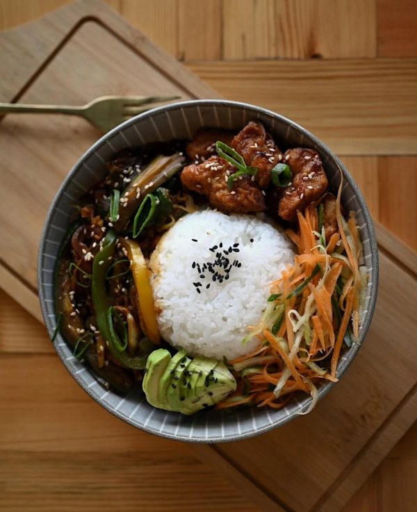 Noodle soup bowl, The Noodle Bar Joburg, hand-pulled noodles, savory broth, dumplings and spring rolls, Asian food Johannesburg, casual eatery, vibrant food scene, quick takeaway, fresh and tasty meals, popular noodle restaurant, Uber Eats delivery, authentic flavors, cozy dining spot, Joburg ETC
