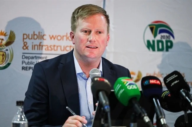 Dean Macpherson, Public Works 2025, South African infrastructure reform, government buildings reused, ghost employee audits, Telkom Towers investigation, EPWP revamp, PSA Oxygen Plant failure, Parliament budget vote speech, Joburg ETC