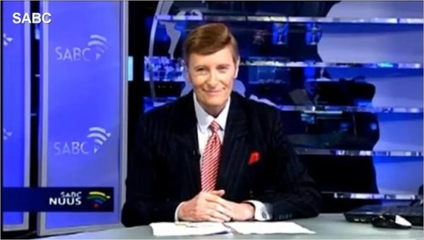 Riaan Cruywagen laughing, SABC blooper, Afrikaans news presenter, 1990s TV moment, iconic South African news, SABC anniversary, TV history, local news nostalgia, famous SA bloopers, Joburg ETC
