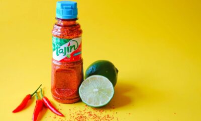 tajín seasoning on pineapple, tajín Durban beachfront snacks, Mexican chilli lime spice, TikTok tajín food trend, spicy fruit seasoning, tajín global craze, tajín South Africa food culture, Joburg ETC