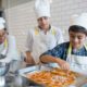 Bambino’s in Pyjamas cooking class, kids cooking Johannesburg, family activities Joburg, salmon sweet potato tots, berry clafoutis dessert, Discovery Vitality event, Dineplan kids event booking, Joburg ETC