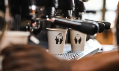 Cult Coffee Co Johannesburg, Kramerville café, artisan coffee Sandton, cosy café interior, barista pouring latte, fresh pastries and sandwiches, breakfast spot Joburg, specialty coffee culture, local coffee shop Johannesburg