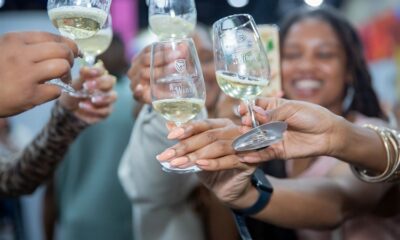 WineX 2025 Johannesburg, wine tasting event Sandton, South African wine festival, bottle and wine glass showcase, winemaker presentation stage, WineX crowd evening, Joburg ETC