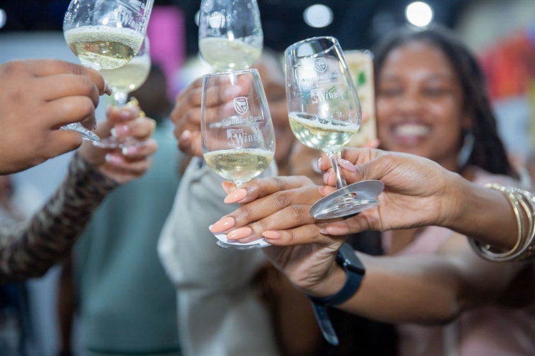 WineX 2025 Johannesburg, wine tasting event Sandton, South African wine festival, bottle and wine glass showcase, winemaker presentation stage, WineX crowd evening, Joburg ETC