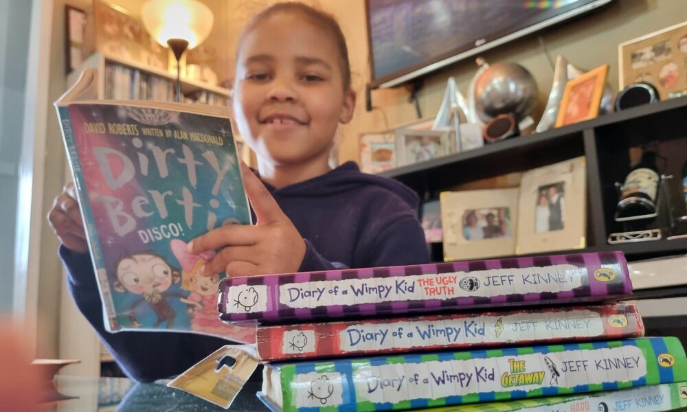 Cassidy Hendricks reading competition, 10 year old Lotus River reader, Premier Alan Winde reading visit, Western Cape literacy finalist, Charlotte’s Web reading child, young South African book lover, Joburg ETC
