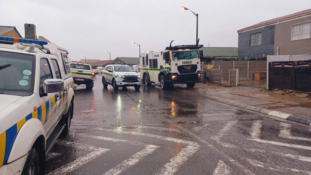 Valhalla Park violence arrests, Cape Flats law enforcement attack, LEAP patrol vehicle stoned and looted, Kalksteenfontein drug house raid, SAPS recover stolen goods, JP Smith condemns attacks, Anroux Marais safety concerns, Joburg ETC