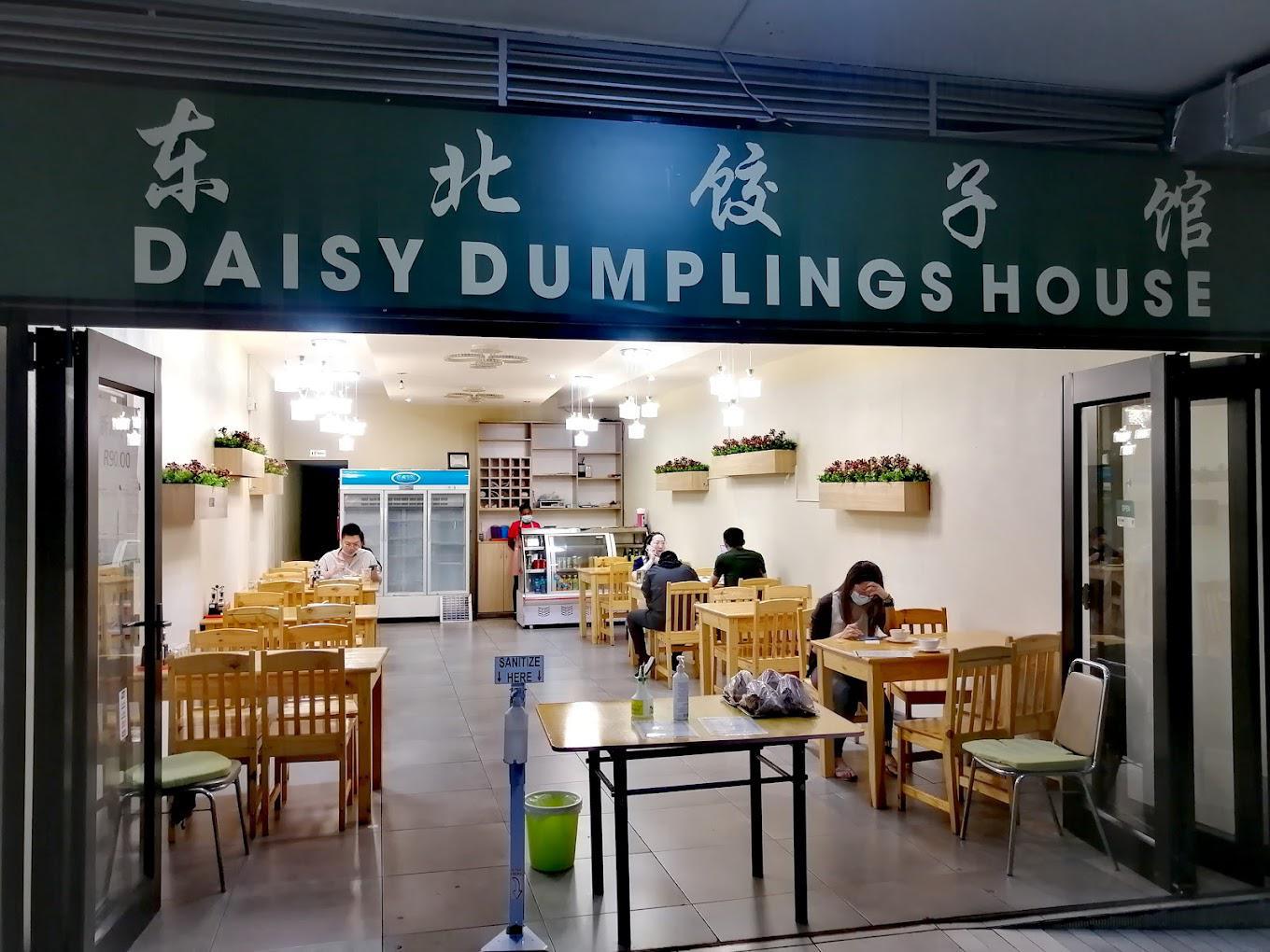 Daisy Dumplings House interior Sandton, handmade dumplings plate Rivonia, Sandton dumpling restaurant Joburg, early dawn shopping centre dumplings, Joburg ETC