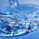 prepaid water meter leak alert, flashing droplet symbol, South African household water saving, meter keypad showing LEAK message, Joburg ETC