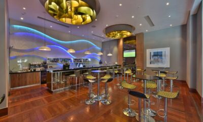 Radisson Blu Gautrain Sandton restaurant, Central One Bar cocktails, Johannesburg fine dining, Sandton business district food, local ingredients cuisine, elegant city dining spot, Joburg ETC