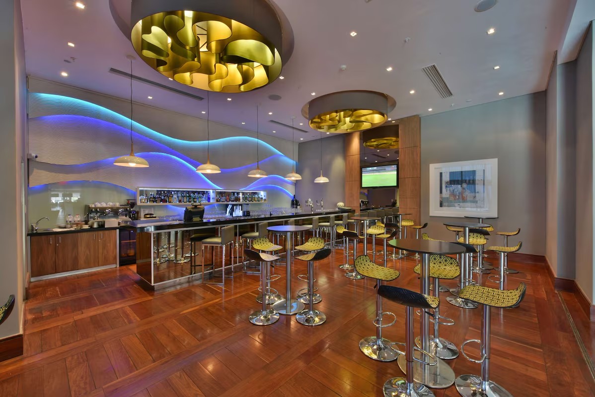 Radisson Blu Gautrain Sandton restaurant, Central One Bar cocktails, Johannesburg fine dining, Sandton business district food, local ingredients cuisine, elegant city dining spot, Joburg ETC