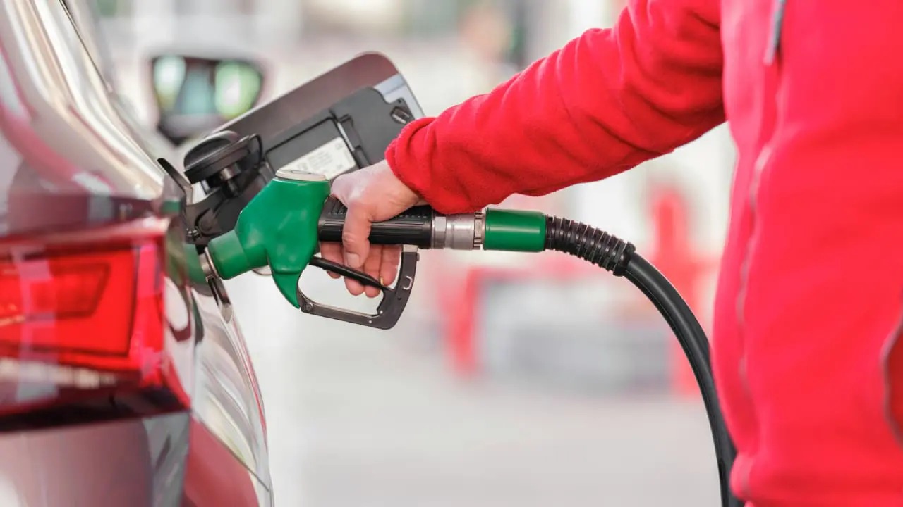petrol price drop South Africa, motorists saving on fuel, oil prices decline, rand strength, CEF report October, filling station Johannesburg, cheaper diesel November, South African economy relief, Joburg ETC
