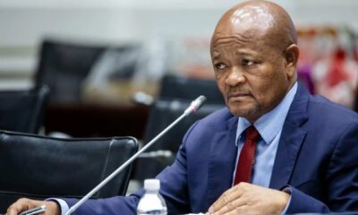 Senzo Mchunu, suspended police minister, corruption investigation South Africa, Madlanga Commission inquiry, Cyril Ramaphosa government, electronic devices handover, political interference probe, Joburg ETC