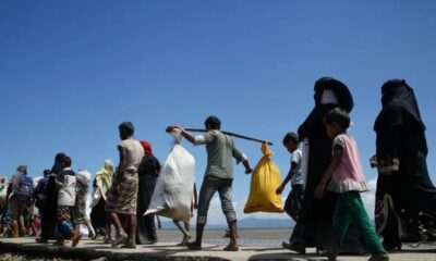 humanitarian corridor conflict zone, safe passage civilians war zone, aid convoy evacuation route, demilitarised humanitarian access area, relief workers delivering aid 2025, Joburg ETC