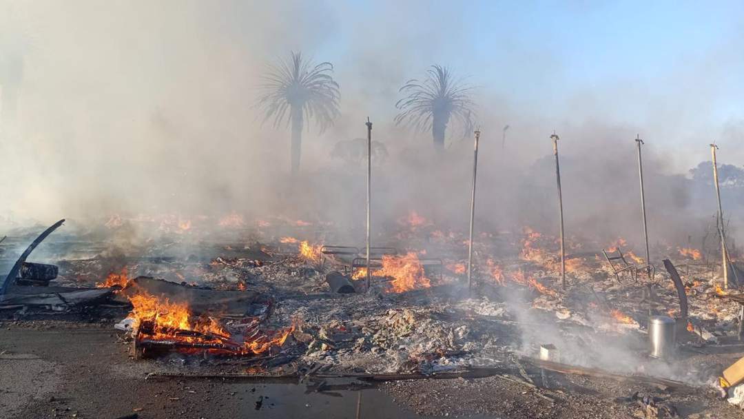 Wingfield Tent City fire, Cape Town disaster response, refugees displaced by fire, Gift of the Givers aid, hot meals for fire victims, SASSA relief support, humanitarian crisis South Africa, Joburg ETC