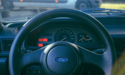 Five Rand coin rests on new Mandela South African banknote