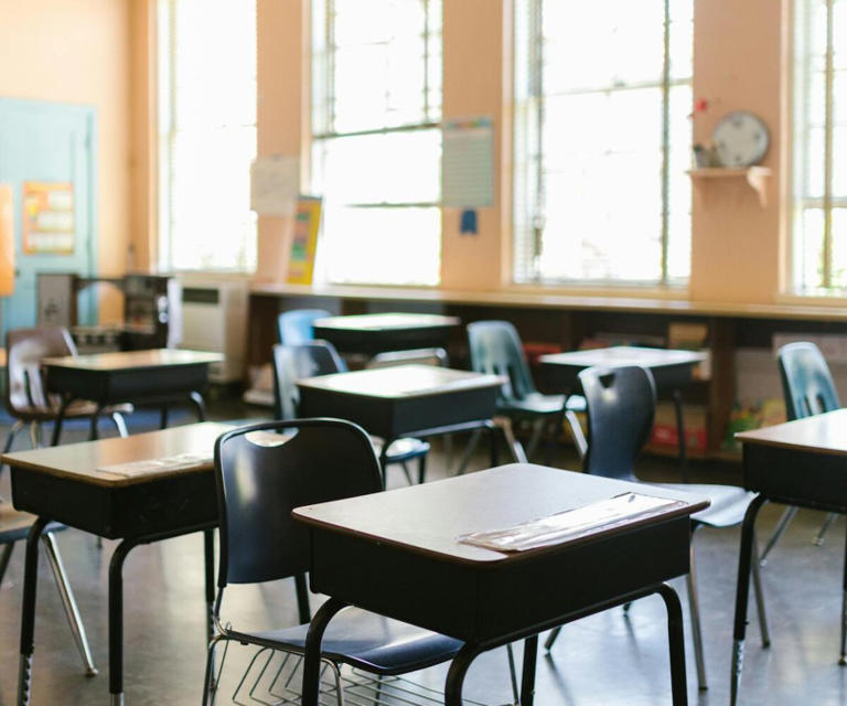 private school classroom South Africa, empty school hallways Johannesburg, parents meeting school fee increase, South African independent school building, worried family budgeting school fees, VAT notice paperwork South Africa, teacher chalkboard classroom, school fee rising envelope, South African flag background education, empty sports field at private school Joburg ETC