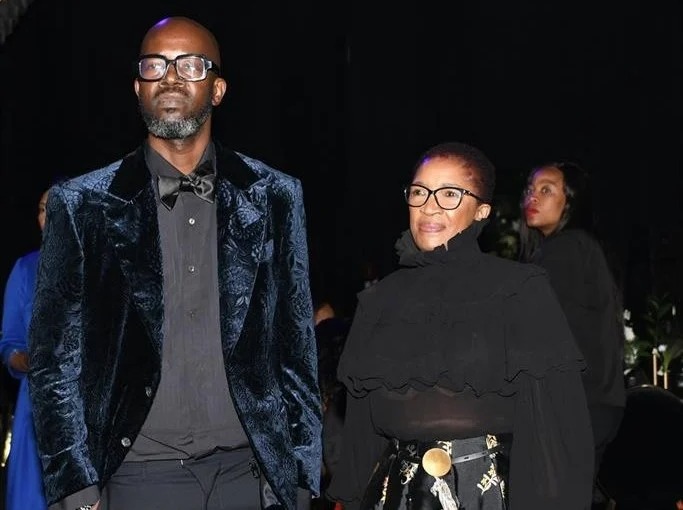 Black Coffee mother smiling at grandchild birthday, South African family gathering, blended family photo, South African DJ Black Coffee’s mom social media controversy, grandmother at child’s birthday, family accountability debate Joburg ETC