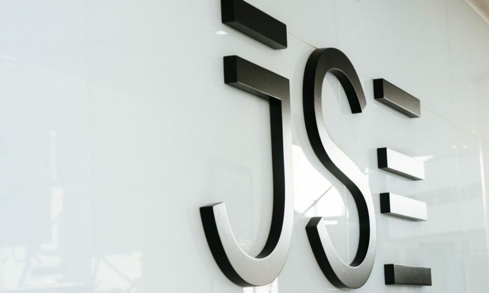 South Africa JSE record high, FTSE JSE All Share Index, Johannesburg Stock Exchange trading floor, mining stocks rally, rand exchange rate strength, Joburg ETC