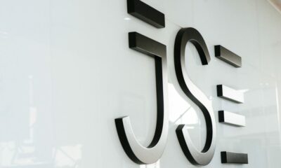 South Africa JSE record high, FTSE JSE All Share Index, Johannesburg Stock Exchange trading floor, mining stocks rally, rand exchange rate strength, Joburg ETC