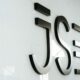 South Africa JSE record high, FTSE JSE All Share Index, Johannesburg Stock Exchange trading floor, mining stocks rally, rand exchange rate strength, Joburg ETC
