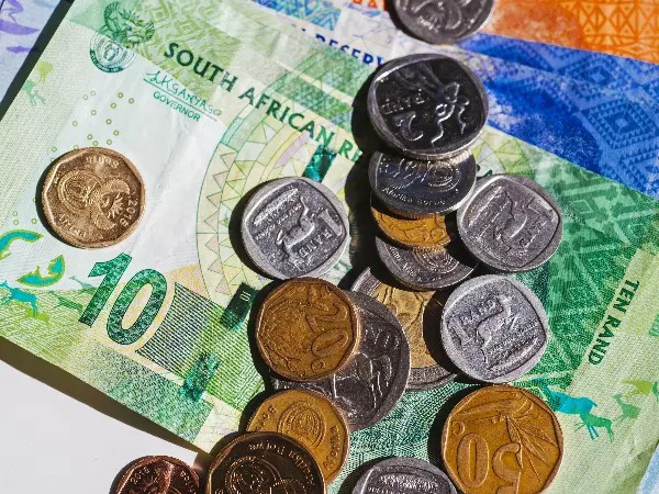 South African rand exchange rate, fuel price decrease South Africa, diesel price drop January, inflation easing South Africa, interest rate outlook SA, Johannesburg petrol station, Joburg ETC