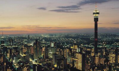 Johannesburg skyline, Sandton cityscape, Soweto Vilakazi Street, Apartheid Museum exterior, summer thunderstorms Joburg, Joburg ETC