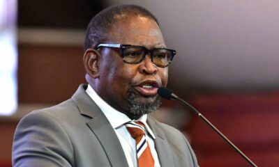 Enoch Godongwana budget speech 2026, South Africa tax brackets 2026 table, National Treasury South Africa logo, South African income tax rates 2026, Parliament budget announcement Cape Town, South African rand notes close up, medical aid tax credits South Africa, Joburg ETC