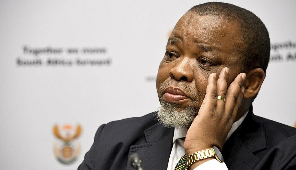 Gwede Mantashe Mining Indaba Cape Town, South Africa mining exploration drilling, platinum mining South Africa 2025, BEE policy reform South Africa, mining sector investment Johannesburg, Mining Indaba conference stage Cape Town, South African mineral exploration site, Parks Tau B-BBEE reform announcement, Joburg ETC