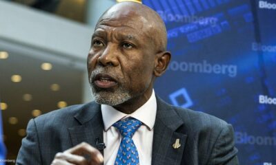 South African Reserve Bank building Pretoria, repo rate South Africa 2026, interest rate cut announcement SA, rand appreciation 2026, gold and platinum exports South Africa, household debt South Africa, inflation target 3 percent SA, Joburg ETC