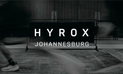HYROX Johannesburg race preparation, athlete packing gym bag, UHT hydration bottle for training, resistance bands workout prep, magnesium spray muscle recovery, heel balm for runners feet, protein supplement tubs travel size, energy gels race morning fuel, Johannesburg fitness competition 2026, Joburg ETC