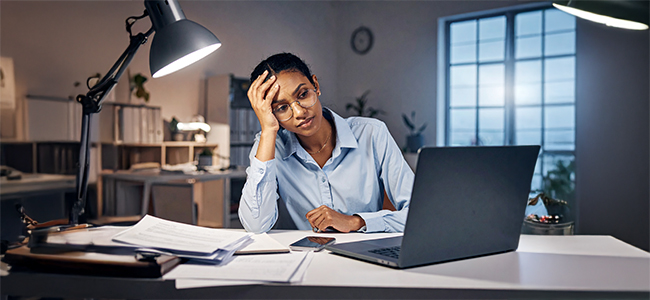 South African small business owner working late, entrepreneur stress South Africa office desk, tired SME founder laptop night, business burnout South Africa 2025, small business productivity loss SA, Emotional Tax report South Africa, Xero South Africa small business survey, overwhelmed entrepreneur paperwork desk, SME financial management South Africa, Joburg ETC