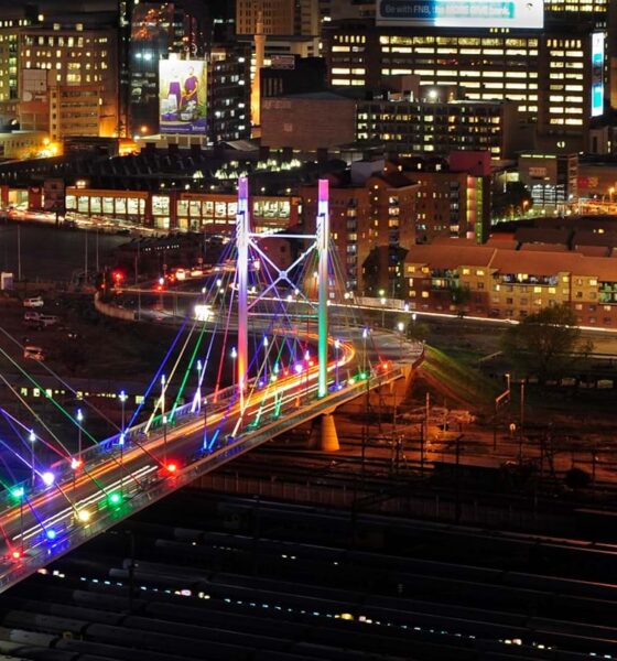 Night photography Johannesburg, Nelson Mandela Bridge at night, Sandton skyline 2026, Maboneng neon lights, Munro Drive viewpoint skyline, The Wilds Houghton night view, Carlton Centre Top of Africa lights, Montecasino night architecture, Villa Simonne fairy lights, Emmarentia Dam reflections, Joburg city lights panorama, Joburg ETC