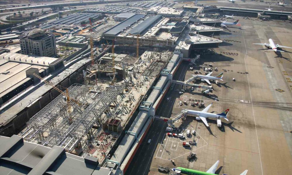 O.R. Tambo International Airport terminal upgrades, O.R. Tambo airport renovations Johannesburg, airport bathroom refurbishment South Africa, escalator upgrades O.R. Tambo, international boarding gates O.R. Tambo, jet fuel infrastructure airport, passenger experience improvements airport, Johannesburg airport construction, South Africa aviation infrastructure, Joburg ETC