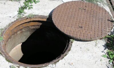 Tembisa sewage spill, Esselen Park flooded home, blocked manhole Tembisa yard, sewage overflow Gauteng 2026, City of Ekurhuleni sewer response, municipal jetting machine clearing blockage, sewage contamination residential house, South Africa infrastructure crisis, Joburg ETC