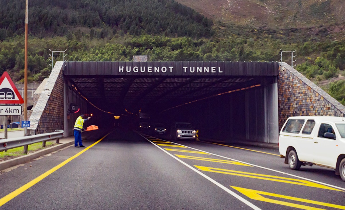 Huguenot Tunnel South Africa, Du Toitskloof Mountains tunnel, N1 highway tunnel Western Cape, Sanral tunnel upgrade project, longest road tunnel Africa, Paarl to Worcester route, South African road infrastructure, tunnel ventilation system, Hugo’s River Viaduct wind barriers, Paarl Africa Underground Laboratory, Joburg ETC