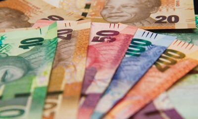 South African rand against US dollar, rand exchange rate R16 per dollar, US Federal Reserve meeting minutes 2025, Annabel Bishop Investec economist, Kevin Warsh Fed chair nominee, dollar strength emerging markets, South Africa currency volatility, Joburg ETC