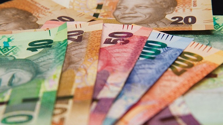 South African rand against US dollar, rand exchange rate R16 per dollar, US Federal Reserve meeting minutes 2025, Annabel Bishop Investec economist, Kevin Warsh Fed chair nominee, dollar strength emerging markets, South Africa currency volatility, Joburg ETC